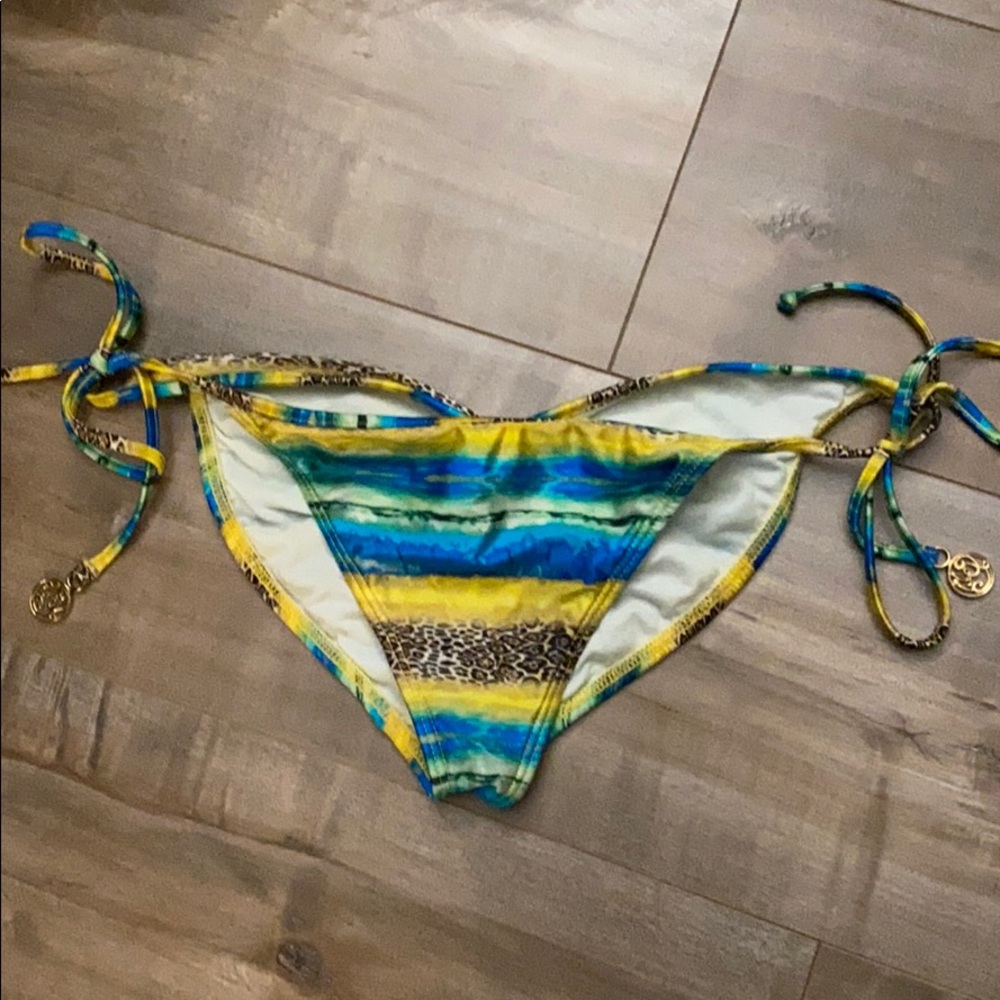 LULI FAMA: Wavey Ruched Back Tie Side Bottoms